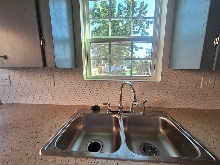 kitchen sink with sunny window