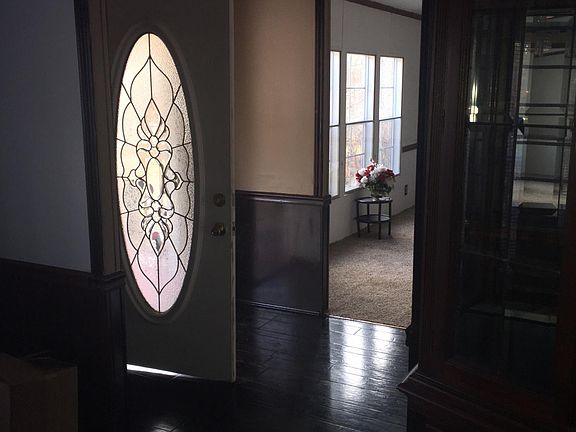 Front door and foyer with closet