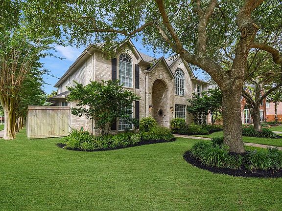Here is a side view of the curb appeal this beautiful home has to offer.