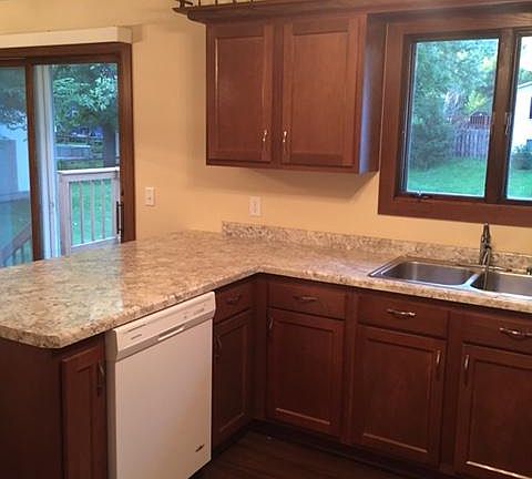 Kitchen and dining room overlook backyard