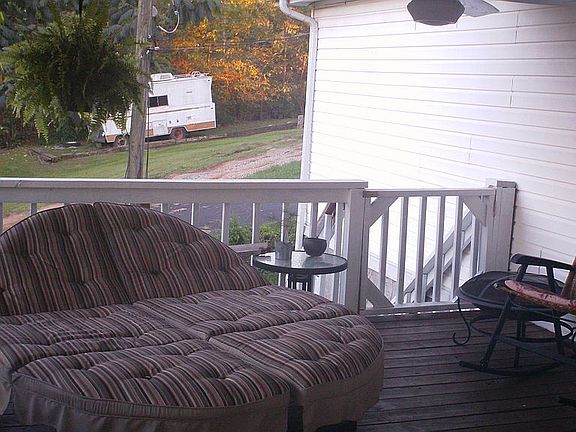 stairs lead to fenced yard