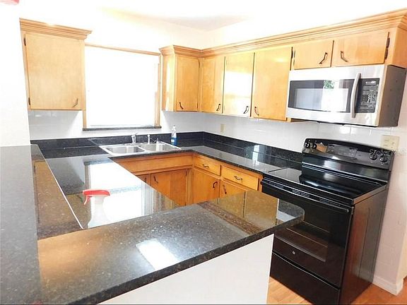 2nd image of 9398 Sun Isle Dr NE