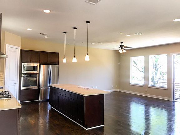 Open floor plan, pre wired, picture windows, and   10 foot ceilings. Balcony  of the living room.