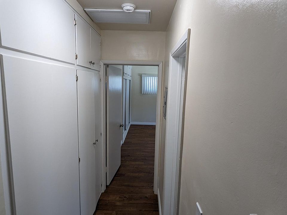Hallway with bonus closet