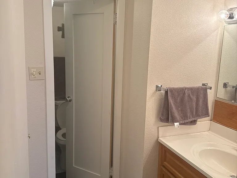 Primary bath area with 2 huge closet spaces.