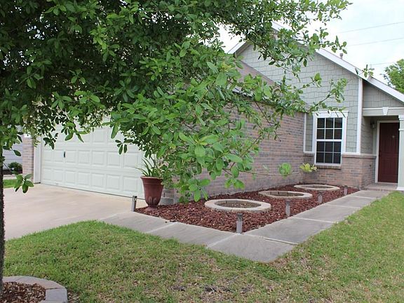 SIDE VIEW FRONT OF THE HOUSE