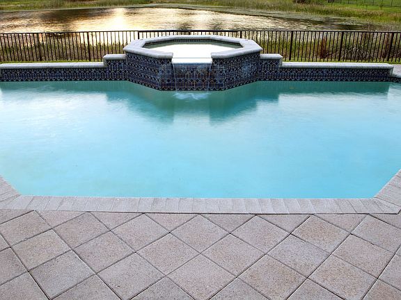 Pool Overlooks Natural Lake Setting