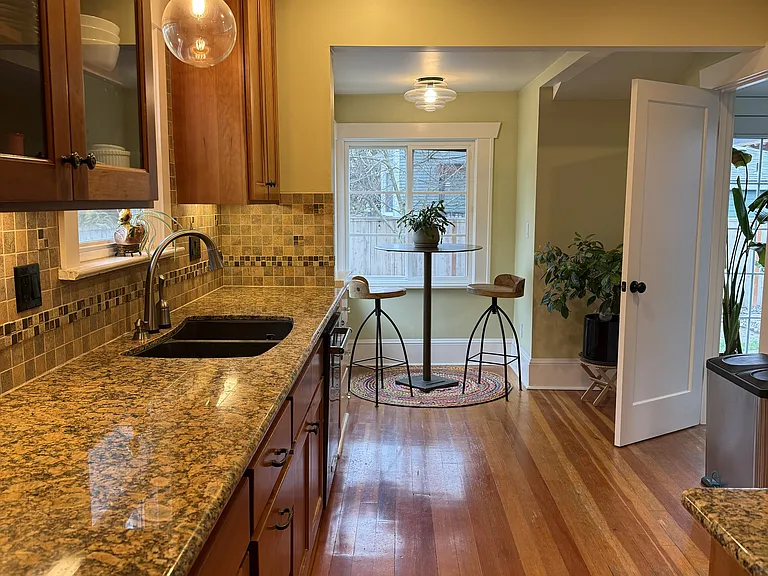 Kitchen with stainless steel appliances and breakfast nook