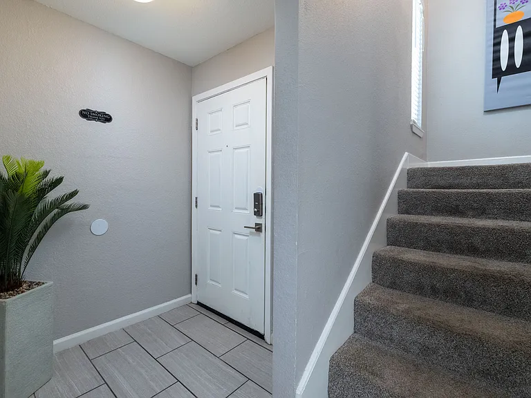 Front Entry and stairs to second floor.