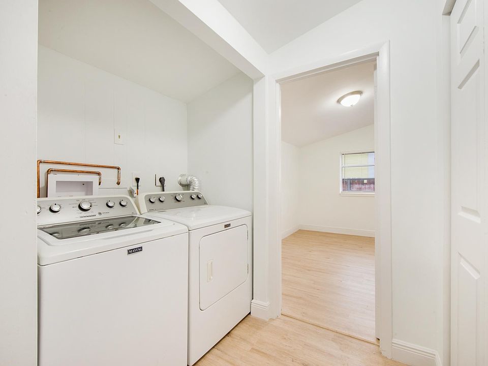 washer dryer across from pantry closet