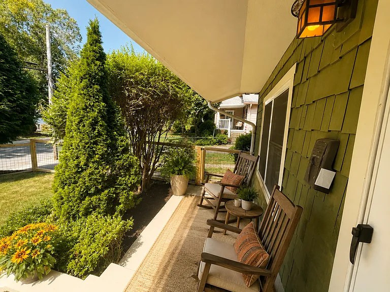sunlit front patio (virtually staged)