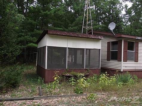 Screen porch with electric outlets for bug free napping