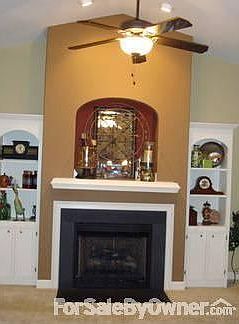 Fireplace
						:
						Built in bookshelves, open area above fireplace wired for TV hook up.