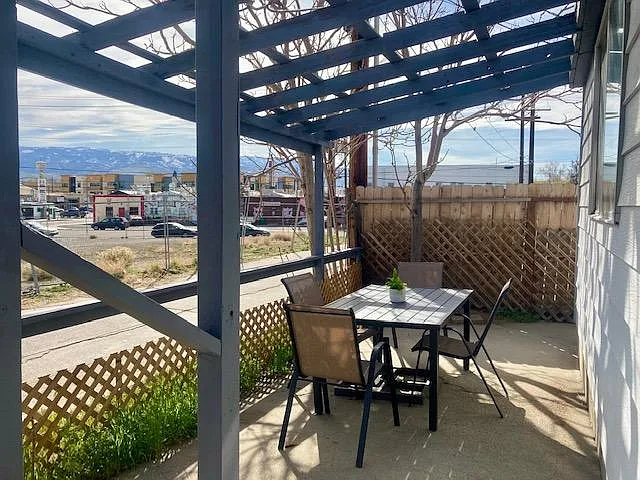 Front porch dining area - with great views of the mountains and city!