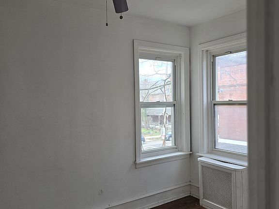 Another with of the bedroom that has fan