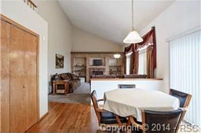 Dining area opens up to both the kitchen and family room.  Real