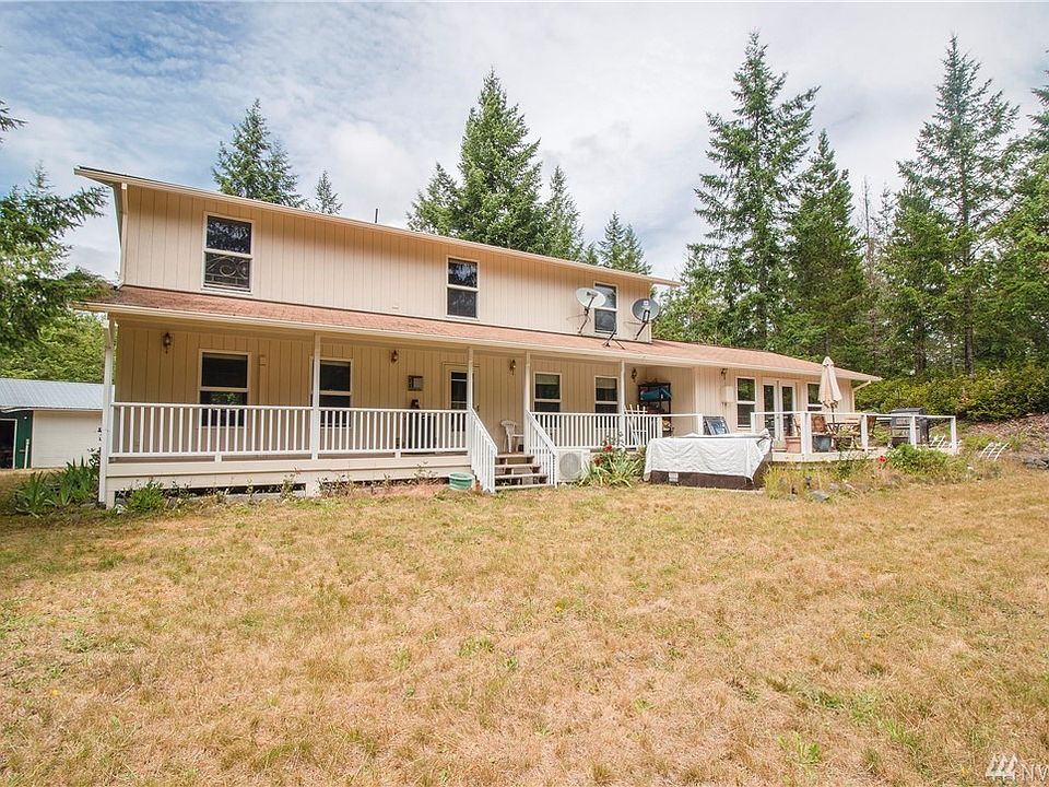 Front of home showing the large covered deck.