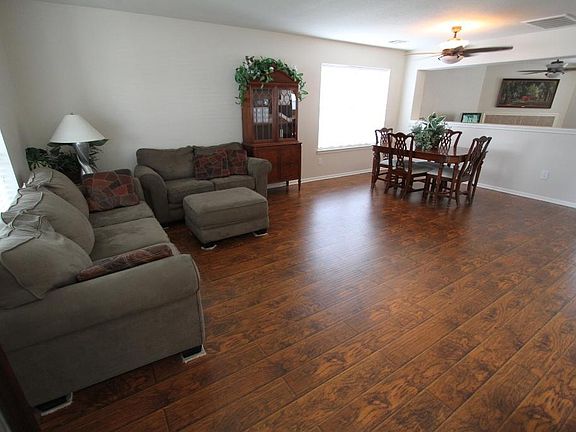 ENTRANCE VIEW WITH LARGE FORMAL LIVING AND DINING