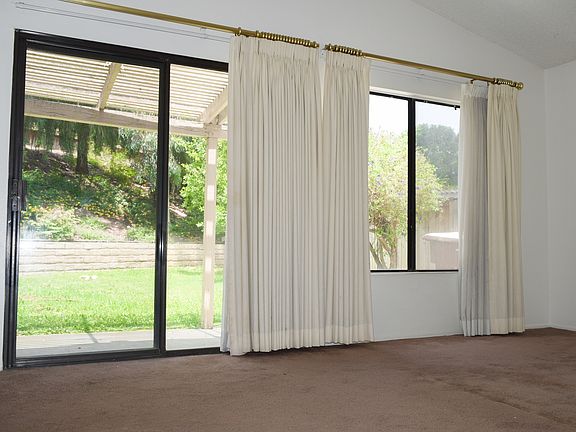 Sliding glass door from Master Suite to backyard