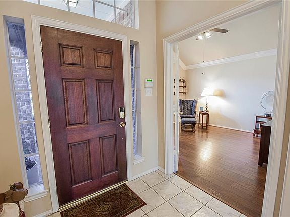The study features deep crown molding and lovely high ceilings!