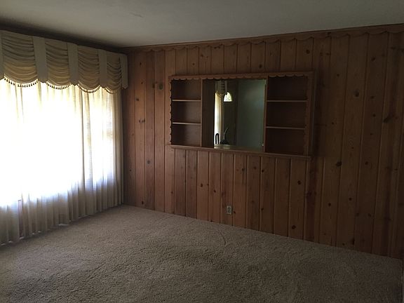 living room with book shelve