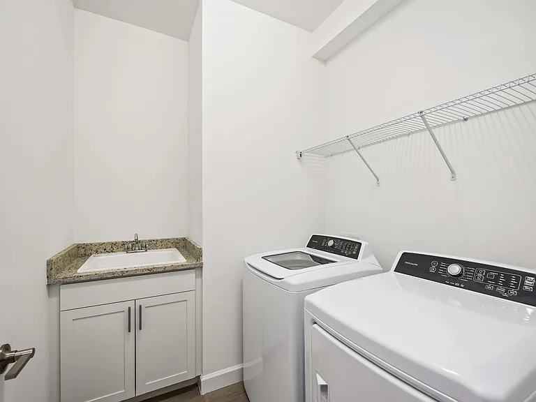 Laundry with Washer/Dryer and utility sink