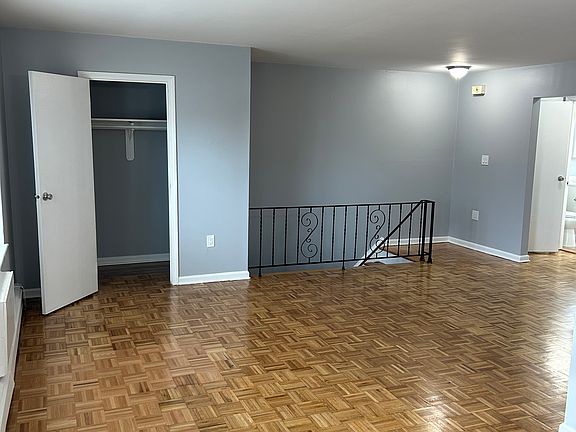Living room from kitchen with large closet