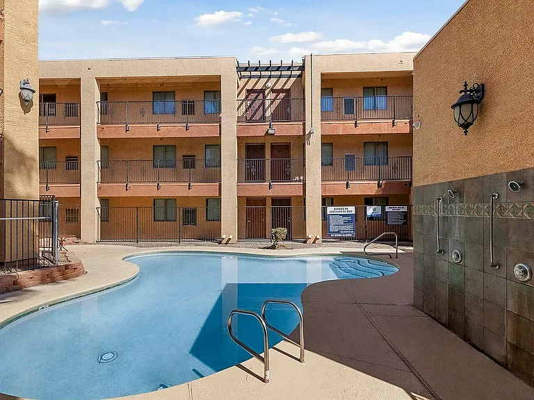 Experience relaxation in this welcoming courtyard with a sparkling pool.