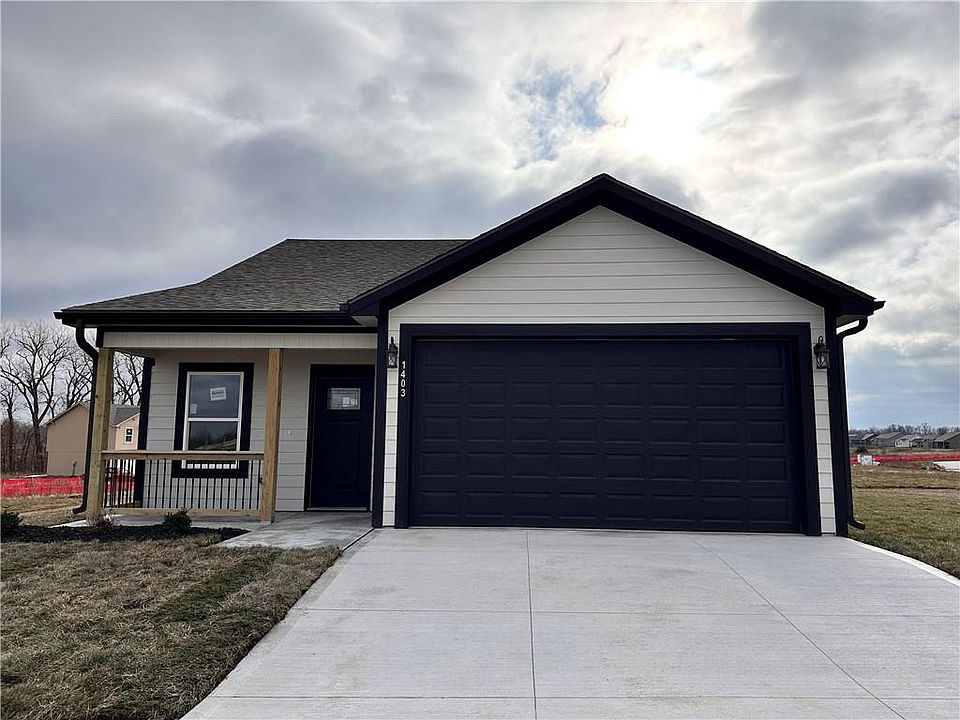 1st image of 1403 NE White Oaks Ln