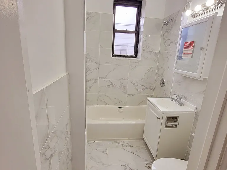 13217 Maple Ave #C104 — Photo 6