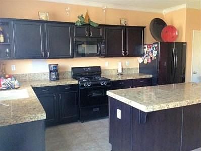 3rd image of 872 Kiwi St