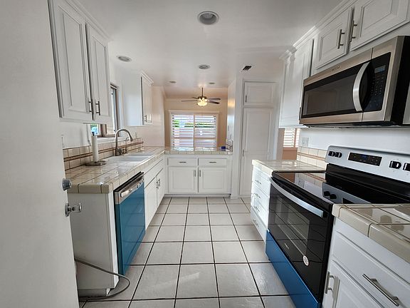 Kitchen includes brand new induction range stovetop / oven, brand new dishwasher and microwave. reverse osmosis water filter installed under sink.