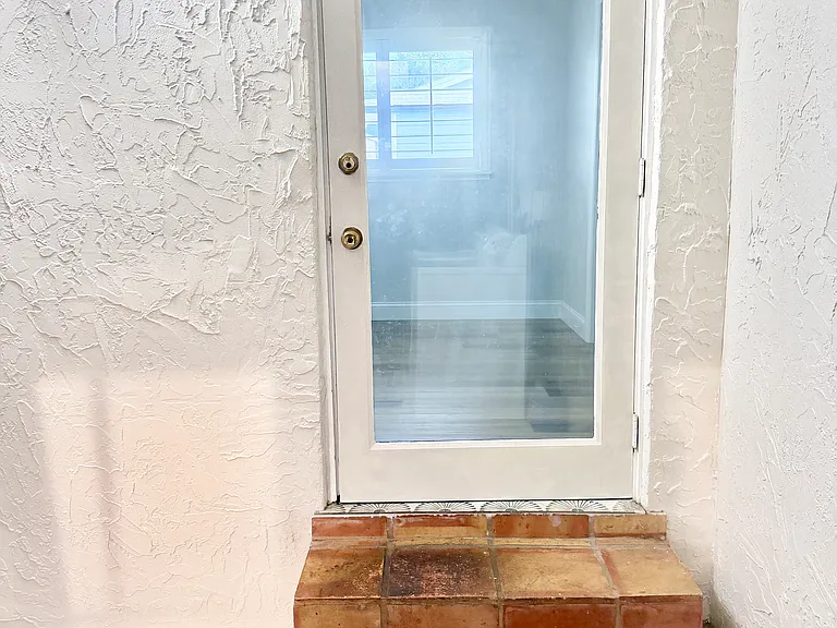 Door from laundry to back sleeping area