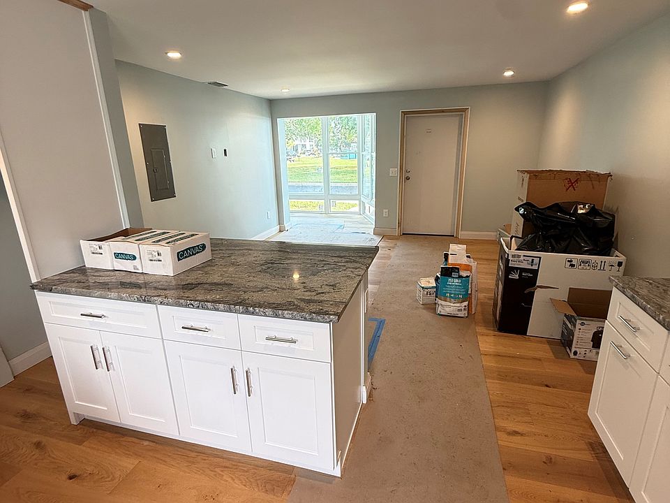 Kitchen & view of living room.
