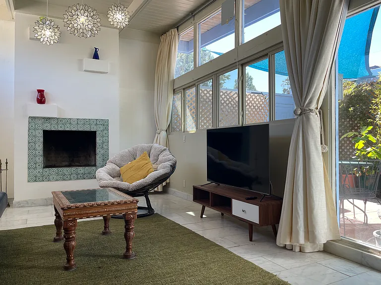 Living room, with view of private courtyard.