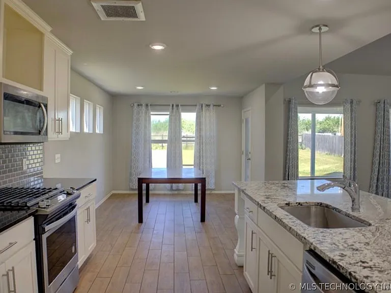 7012 S Elder Ave — Photo 13