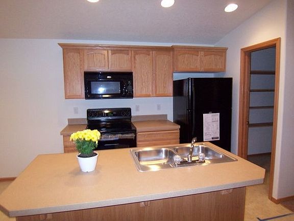 Large open kitchen with pantry, eat at bar and dining room