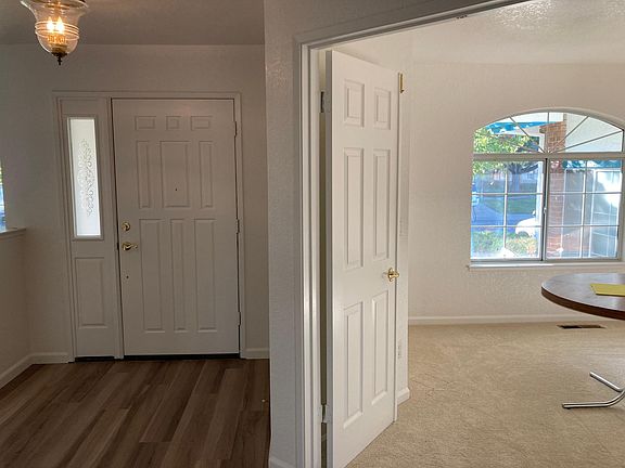 Front Door and Office/Bedroom 4 with closet.