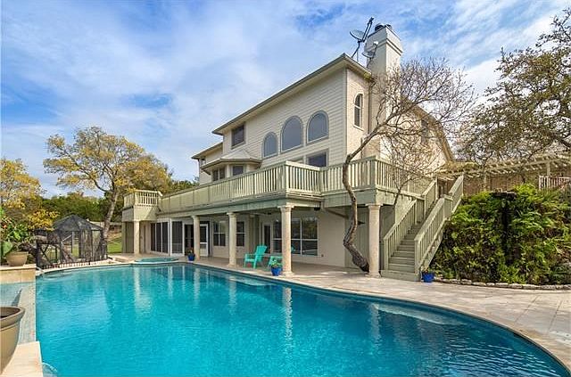 Beautiful outdoor space. 48 ft negative edge pool with swimming lane.  9 feet deep.