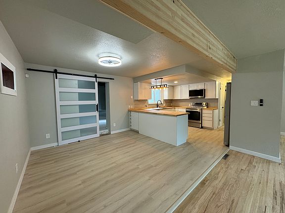 Dining room , barn door leading to entertainment room