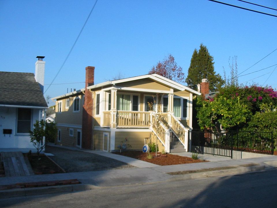 Front of house with large sunny porch