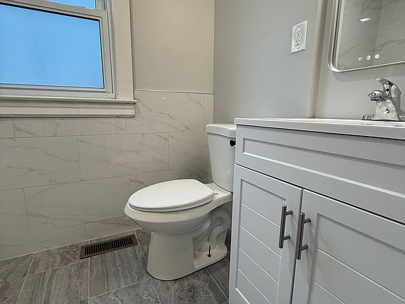 New Bathroom - Tiled Walls and Floor.