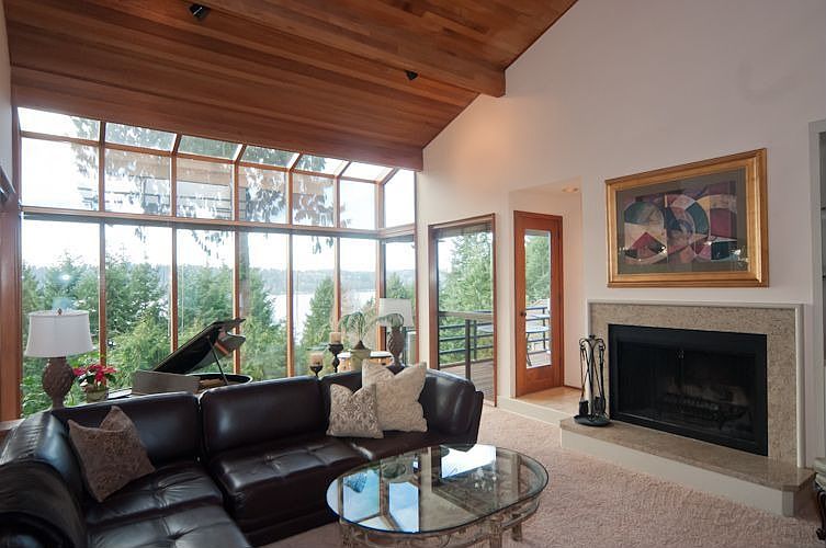 Living Room to Sun Room opening to deck
