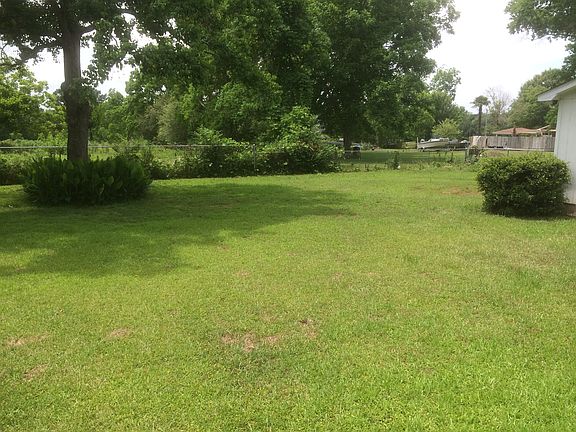 Spacious backyard with fencing