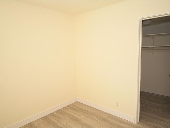 Bedroom view of walk-in close