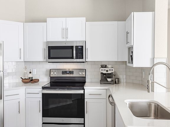 2nd image of 10800 Brighton Bay Blvd NE APT 1102