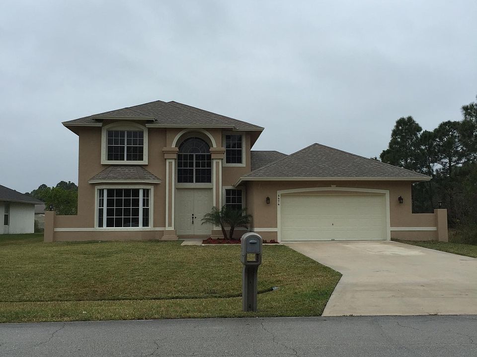 1st image of 6474 NW Volucia Drive