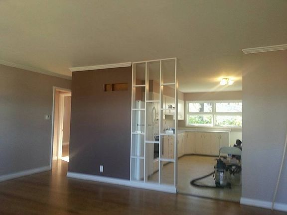 Looking toward the kitchen from the front door. Lots of cha