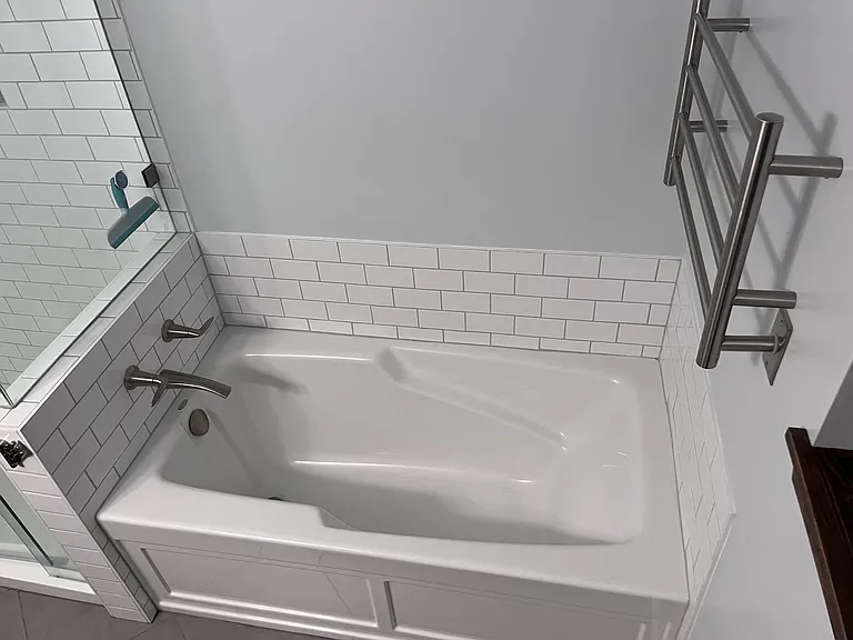 Soaking tub and heated towel rack