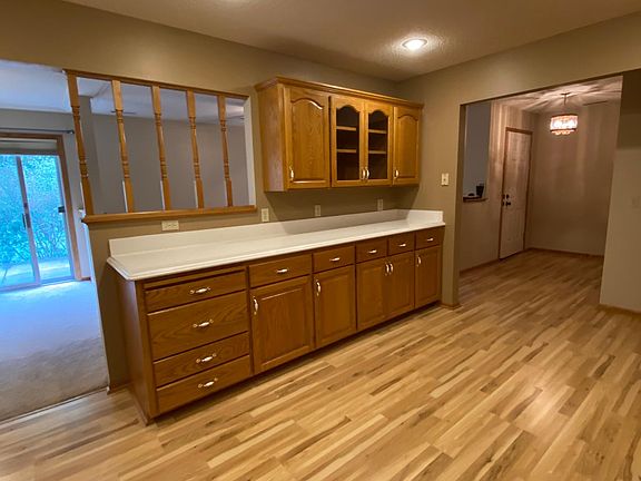 Kitchen: Big enough for a small table or informal high-top w/ stools.